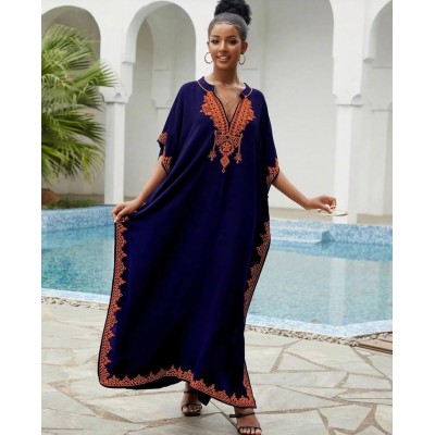 Bohemian Navy Floral Caftan Dress - Plus Size Beach Coverup with Embroidery Plus size woman wearing navy floral caftan dress with embroidery at beach