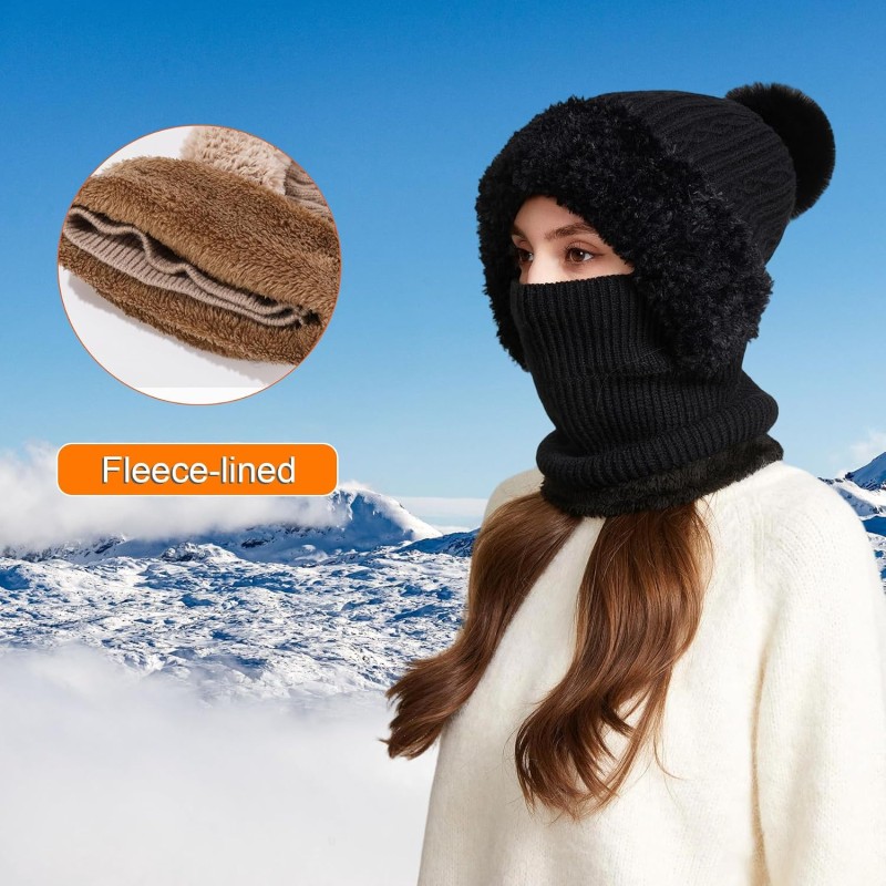 Woman wearing a knitted fleece lined balaclava as hooded beanie and neck warmer in snowy winter