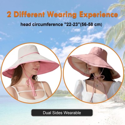 Women in reversible wide brim sun hat with UPF 50+ protection