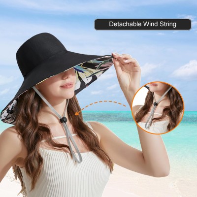 Women wearing reversible wide brim sun hat with UPF 50+ protection, bohemian bucket style for hiking and beach