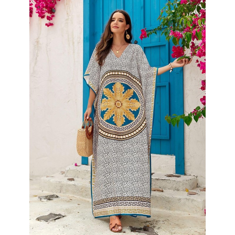 Woman wearing plus size bohemian floral kaftan dress as swim coverup