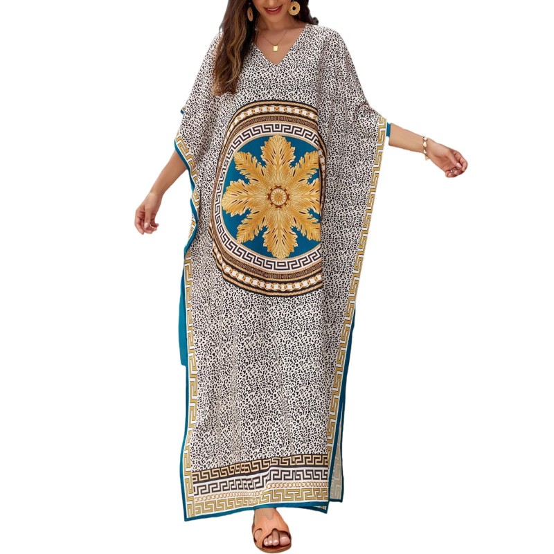 Woman wearing plus size bohemian floral kaftan dress as swim coverup