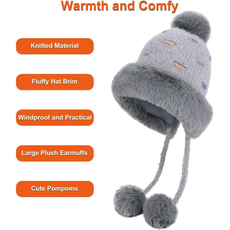 Women's gray knit winter ponytail beanie with sherpa lining, ear flaps, and 3 pompoms