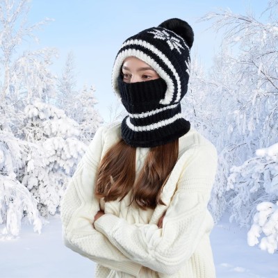 Women's winter knitted balaclava beanie with pompom and fleece lining