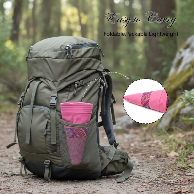 Women's pink reversible wide brim sun hat with UPF 50+ for beach and gardening