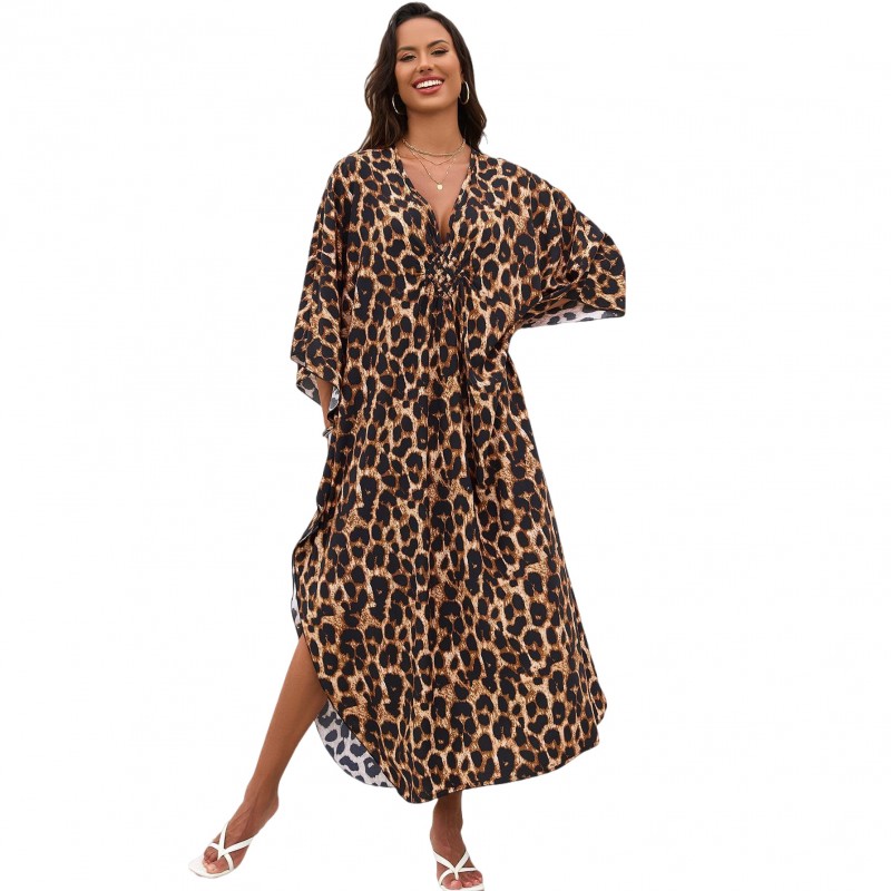 Bohemian Leopard Caftan Dress Coverup Plus size woman wearing bohemian leopard print caftan dress as swim coverup on beach
