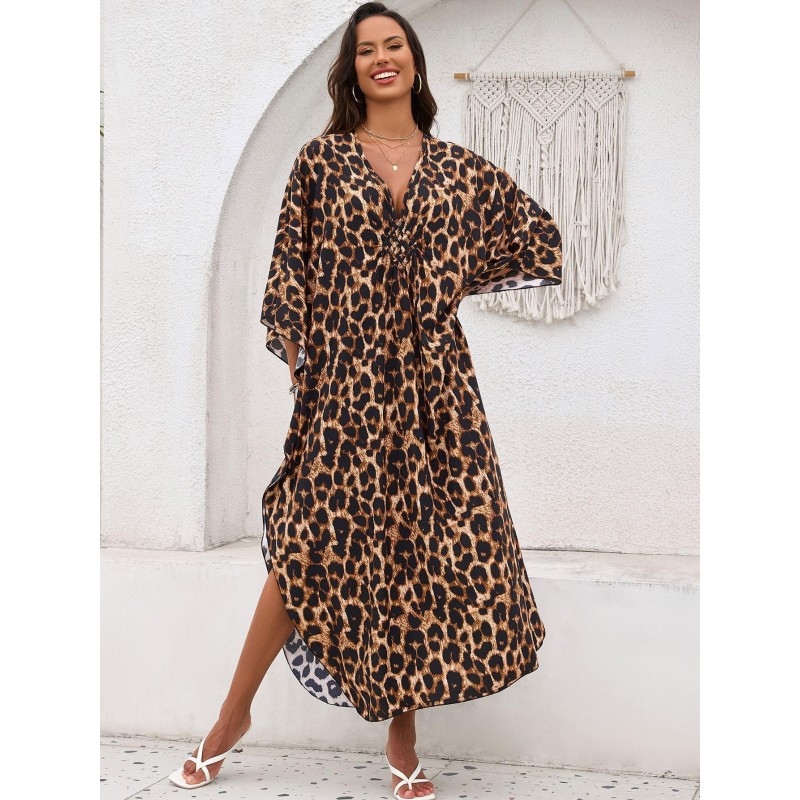 Bohemian Leopard Caftan Dress Coverup Plus size woman wearing bohemian leopard print caftan dress as swim coverup on beach