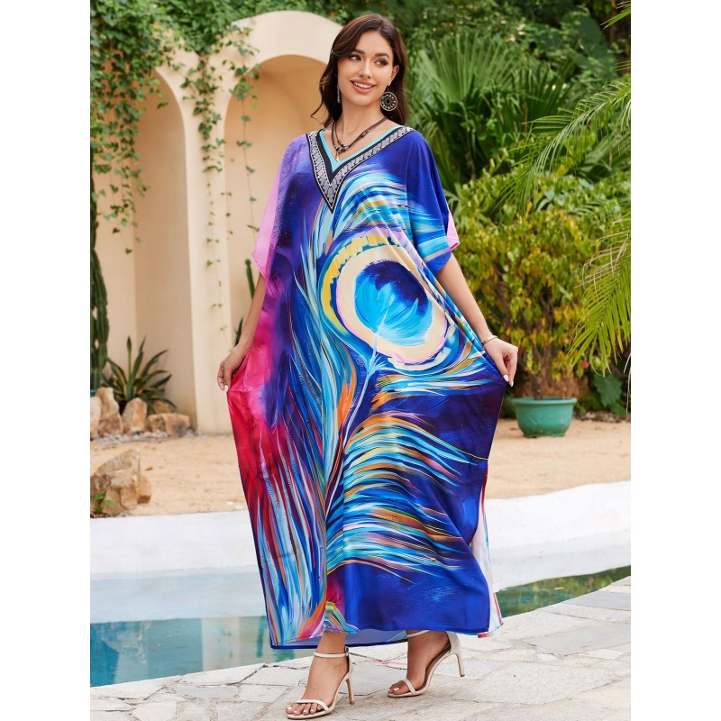 Plus Size Peacock Feather Kaftan - Pool Cover Up Dress Woman in peacock feather print kaftan dress by pool with plants