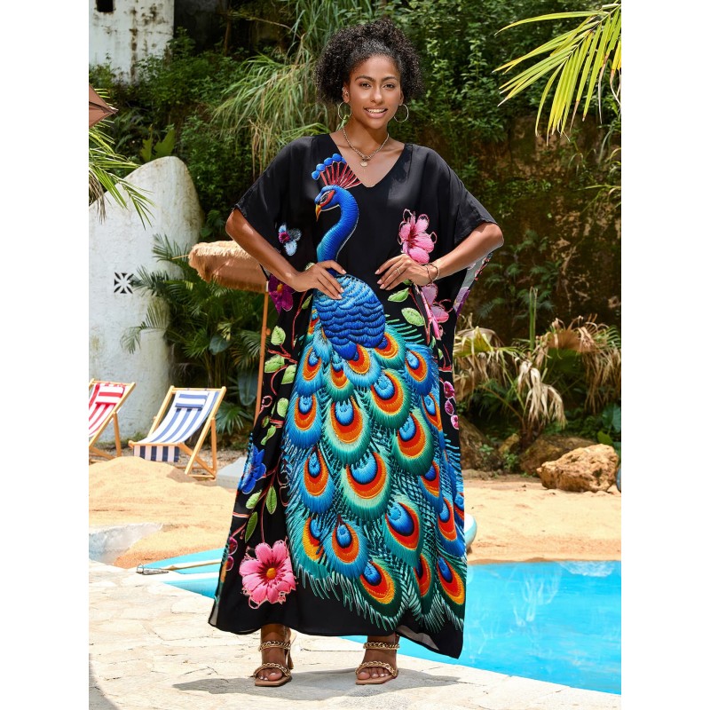 Tropical Bohemian Kaftan Dress with Peacock Print Woman in black floral print V-neck kaftan dress by pool