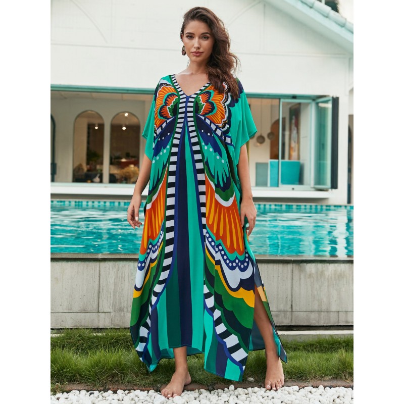 Bohemian Ethnic Print Kaftan Dress – Women's Poolside Cover Up & Loungewear Woman in colorful bohemian ethnic print kaftan dress with batwing sleeves and V-neck standing by a pool
