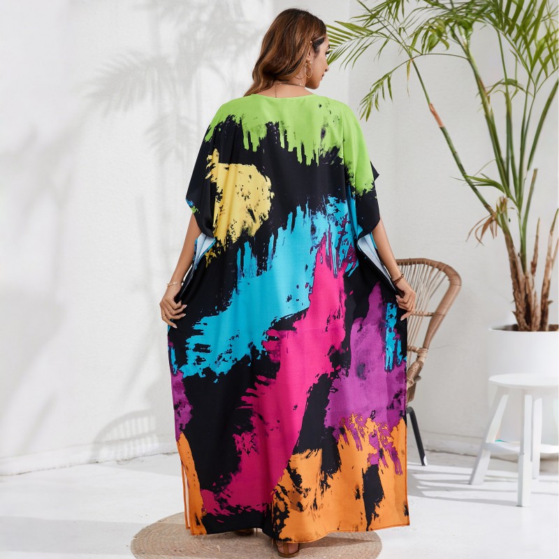Vibrant Splatter Caftan Dress - Resort Wear & Swim Cover Up Plus size woman in black bohemian splatter print caftan dress beach cover up