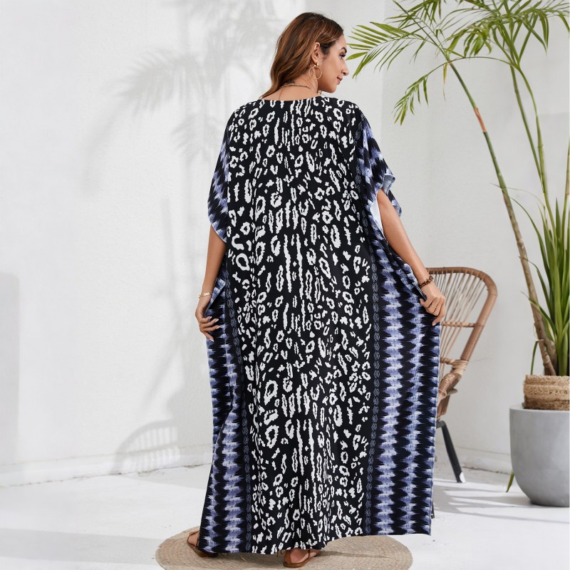 Bohemian Leopar Kaftan Dress - Gradient Stripe Swim Cover Up & Resort Wear Plus size woman in black leopard print kaftan dress with blue gradient stripes beach cover up