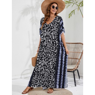 Bohemian Leopar Kaftan Dress - Gradient Stripe Swim Cover Up & Resort Wear Plus size woman in black leopard print kaftan dress with blue gradient stripes beach cover up