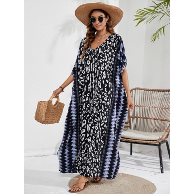 Bohemian Leopar Kaftan Dress - Gradient Stripe Swim Cover Up & Resort Wear Plus size woman in black leopard print kaftan dress with blue gradient stripes beach cover up