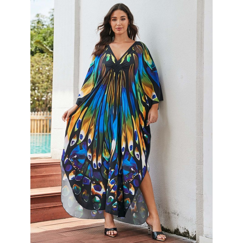 Artistic Resort Kaftan: Beach Cover Up, Lounge Dress & Poolside Elegance Plus size woman in black floral kaftan dress at luxury resort