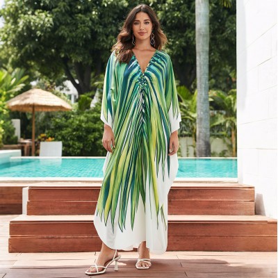 Tropical Resort Kaftan: Mid-Sleeve Cover Up & Lounge Dress Plus size woman in green white tropical kaftan dress with pleated waist at poolside