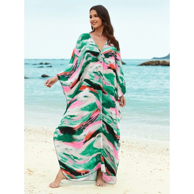 Plus Size Caftan Dress Women’s Beach Cover Up with Vibrant Print Woman in plus size caftan dress with vibrant green pink print standing on beach