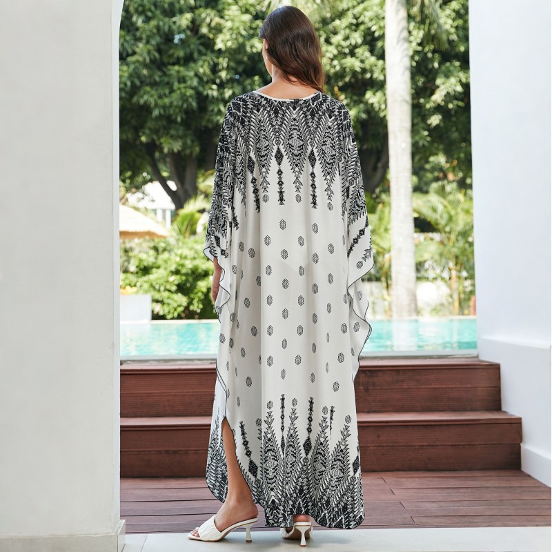 Artistic Boho Kaftan Dress: Beach Cover Up, Lounge Wear & Resort Maxi Plus size woman in unique floral geometric print kaftan dress at beach resort
