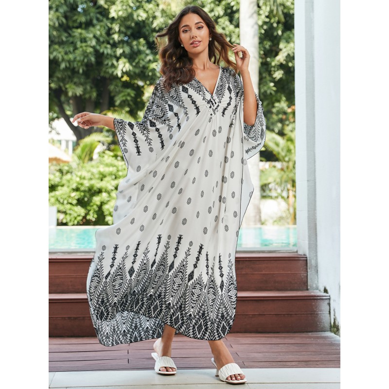 Artistic Boho Kaftan Dress: Beach Cover Up, Lounge Wear & Resort Maxi Plus size woman in unique floral geometric print kaftan dress at beach resort