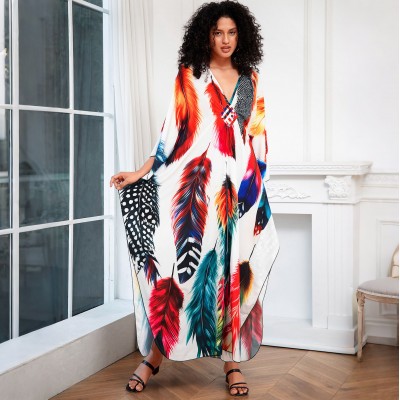 Bohemian Feather Print Kaftan Dress for Women Plus size woman in feather print kaftan dress as beach cover up