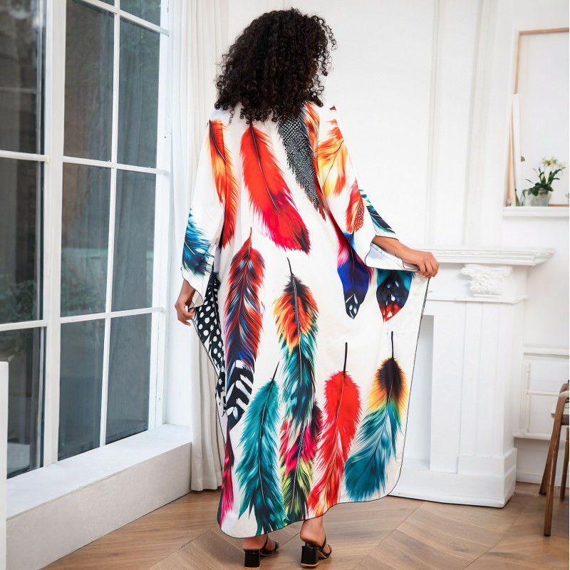 Bohemian Feather Print Kaftan Dress for Women Plus size woman in feather print kaftan dress as beach cover up
