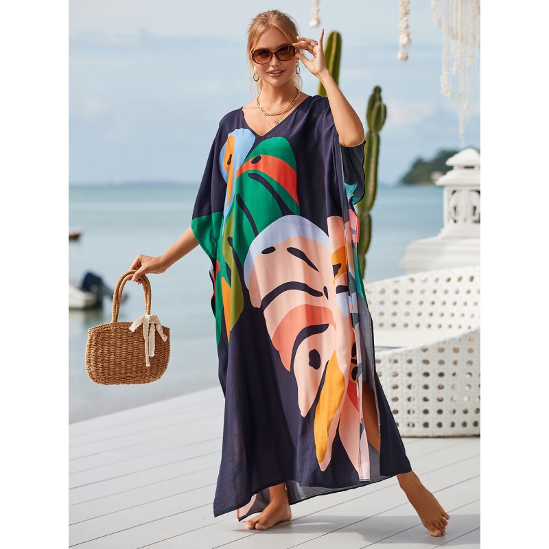 Plus Size Abstract Art Kaftan - Beach Cover Up Dress Woman in navy blue leaf print kaftan dress at beach