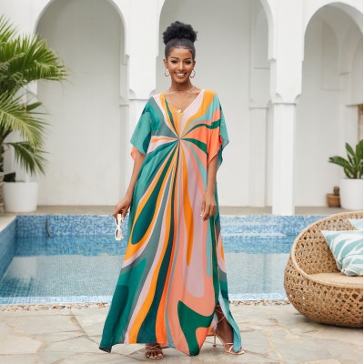 Floral Kaftan Dress for Poolside or Lounge Woman wearing plus size floral kaftan dress at beach