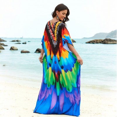 Plus Size Feather Print Caftan Dress - Beach Cover Up Woman wearing bohemian feather print caftan dress at beach