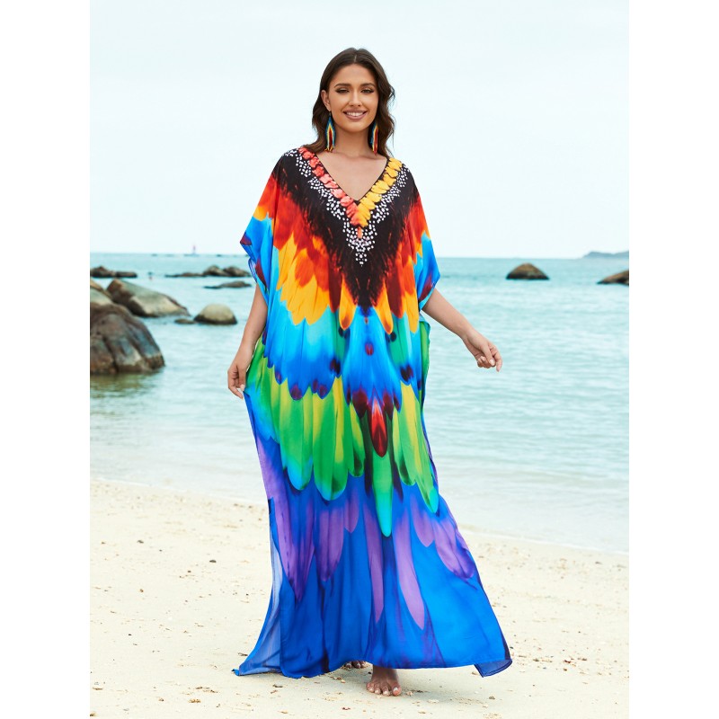 Plus Size Feather Print Caftan Dress - Beach Cover Up Woman wearing bohemian feather print caftan dress at beach