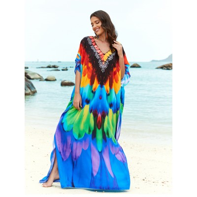 Plus Size Feather Print Caftan Dress - Beach Cover Up Woman wearing bohemian feather print caftan dress at beach