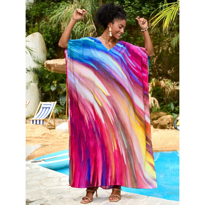 Vibrant Stellar Trajectory Print Kaftan Dress for Women - Poolside Beach Cover Up Woman wearing vibrant stellar trajectory print kaftan dress, loose fit maxi with batwing sleeves and V-neck, standing by poolside