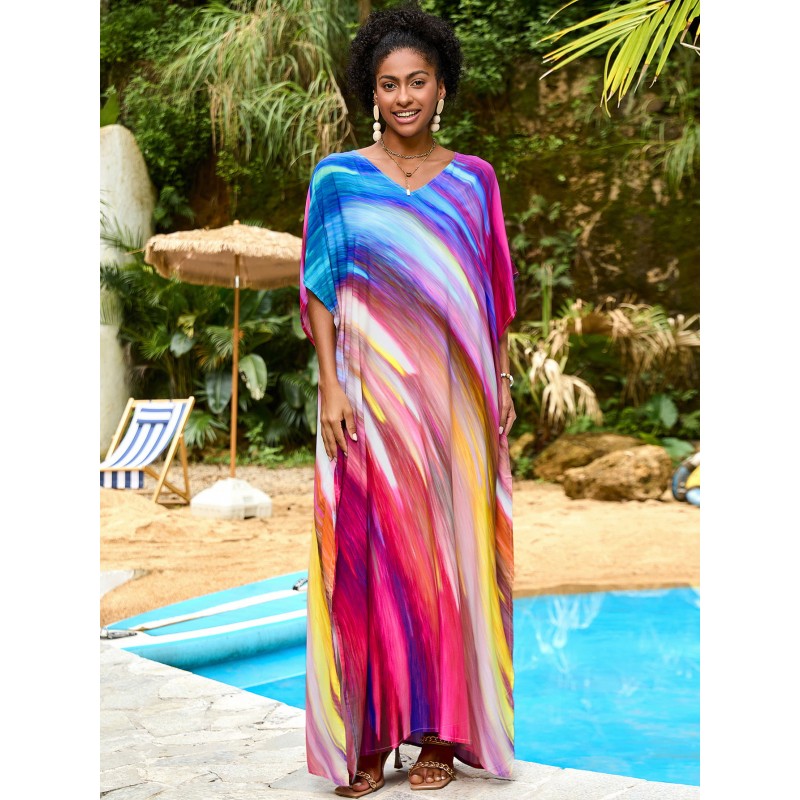 Vibrant Stellar Trajectory Print Kaftan Dress for Women - Poolside Beach Cover Up Woman wearing vibrant stellar trajectory print kaftan dress, loose fit maxi with batwing sleeves and V-neck, standing by poolside